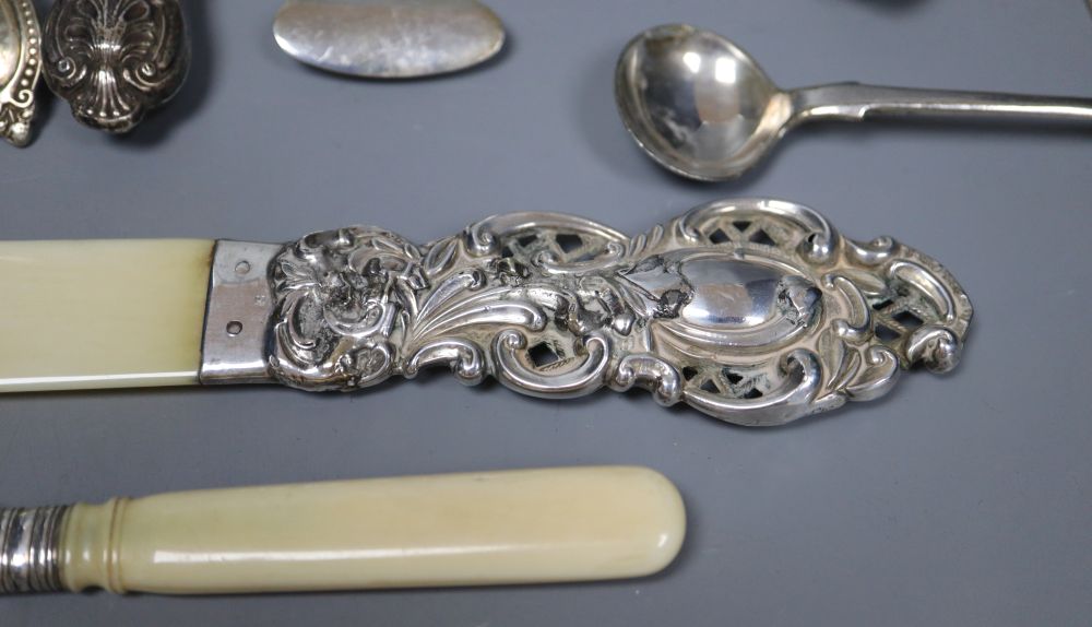 A silver-mounted and ivory page turner and a small collection of silver flatware, Georgian and later,